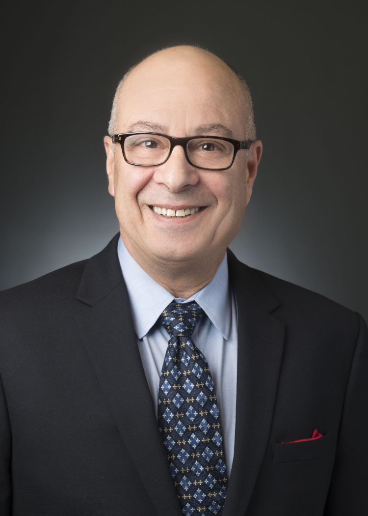 Lewis Rudy, Founder and President of Rudy & Associates